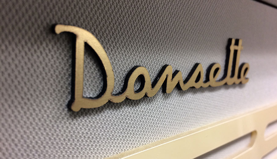 Laser cut old dansette logo for vintage record player. Bespoke project for Plymouth Museum Devon